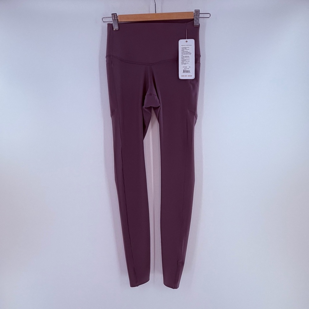 NWT Rhone Defy 7/8 Pocket Legging Deep Plumb Size XS